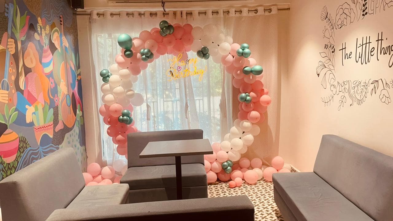 Pastel balloon arch birthday decor